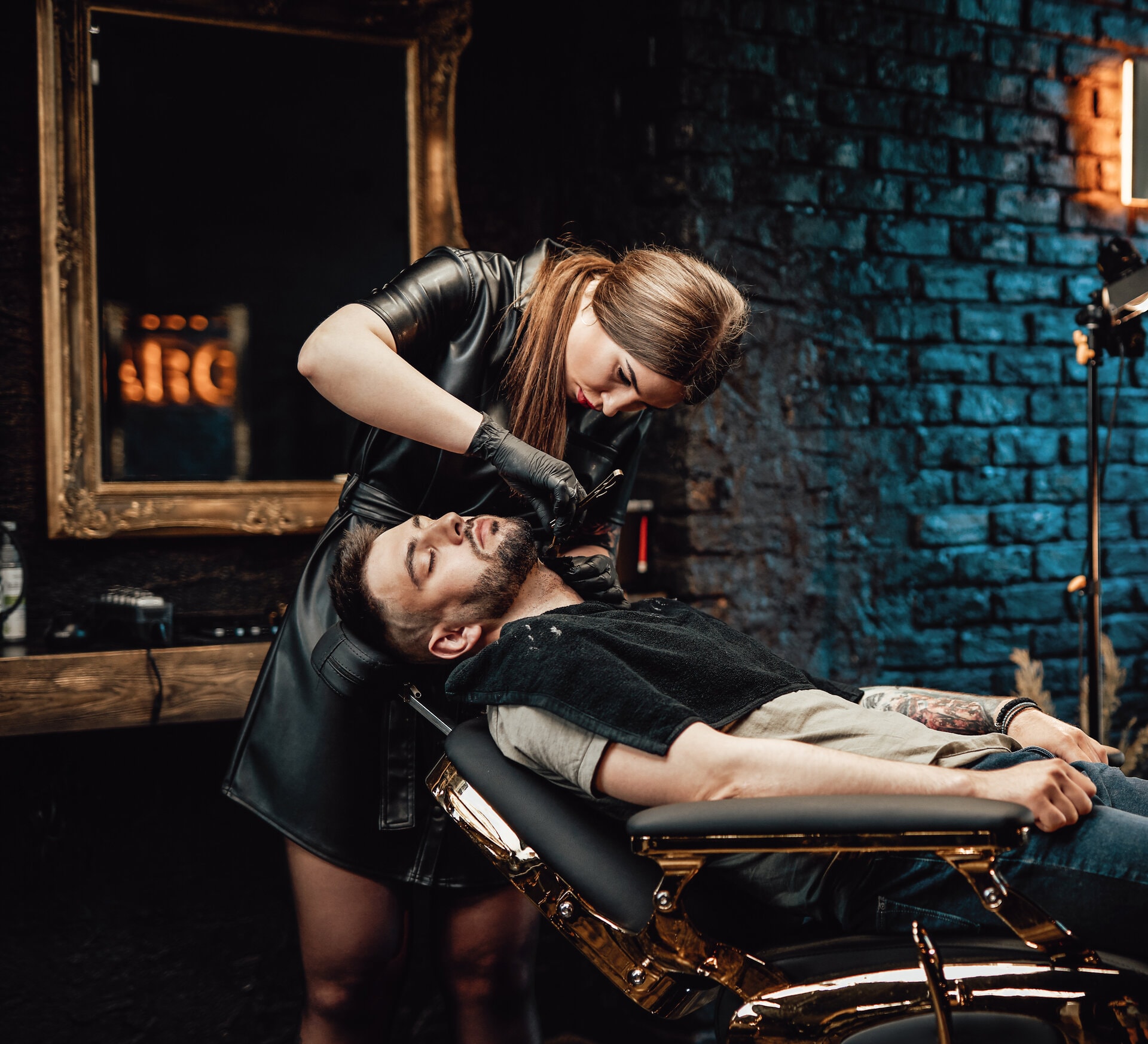 Apex barber detailing a client's beard with precision